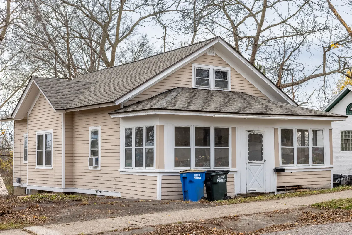 Same home after a fresh exterior repaint by JR Painting & Contracting
